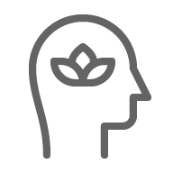 A gray and black icon of a person 's head with a crown on it.